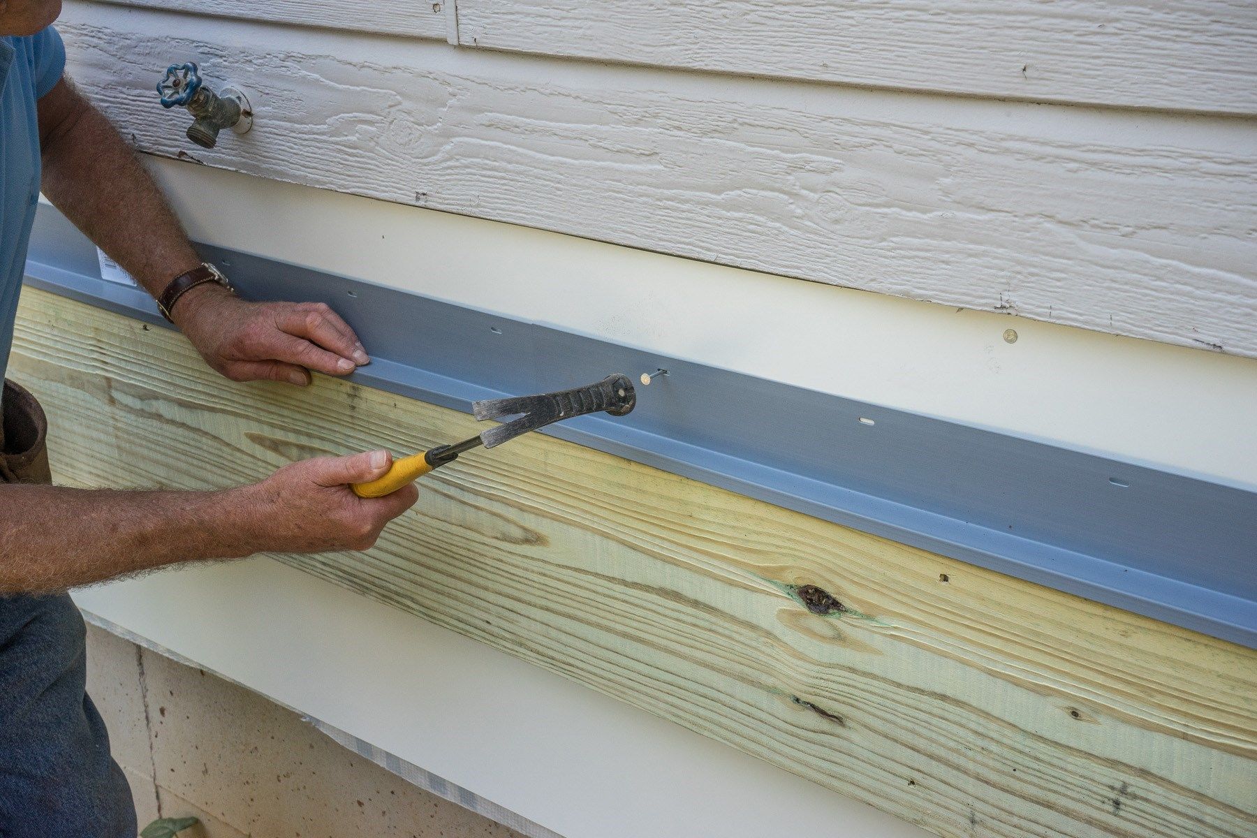 How to prevent water damage behind siding caused by improper flashing installation.